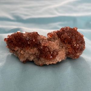 Aragonite specimen that’s loaded with crystals and points.